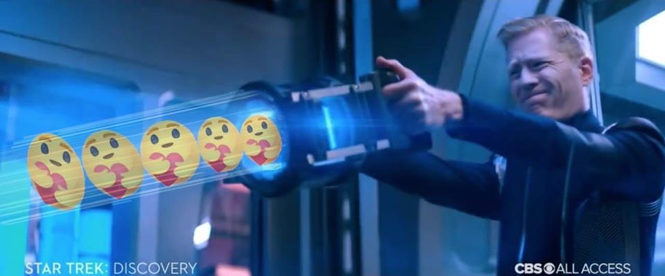 This meme features a still image from the TV show "Star Trek: Discovery" with the main character, Captain Burnham, looking shocked and confused. The image has a series of emojis with shocked faces, and the text "STAR TREK: DISCOVERY" and "I CAN FEEL MY EYES GETTING WIDER" appear below the image. The meme is likely referencing a dramatic or intense moment from the show.